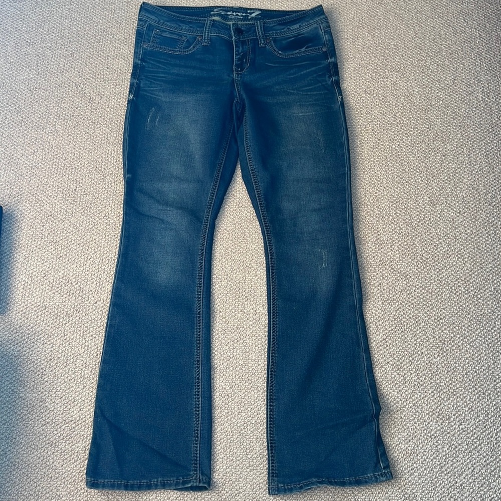 Brand new dark wash seven jeans